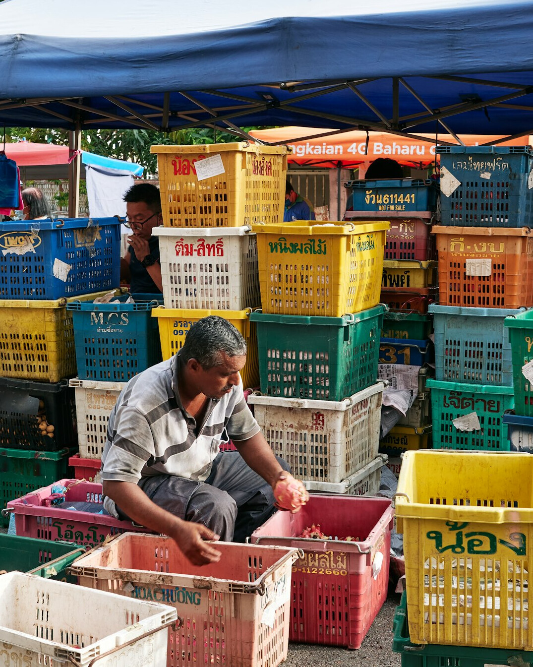 market vendors preparing stalls